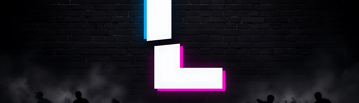 A green neon sign of a sliced letter L on a brick wall, with the dance floor out of focus below.
